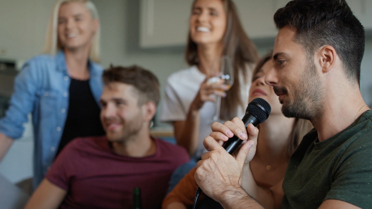 Group of friends enjoying karaoke